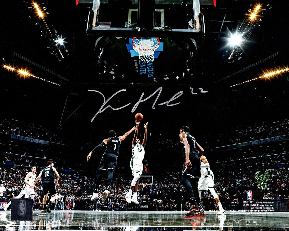 Khris Middleton Signed Milwaukee Bucks 8x10 Action Photo with COA: Khris Middleton Signed Milwaukee Bucks 8x10 Action Photo with COA Capture the excitement of NBA basketball with this signed 8x10 photo of Khris Middleton in action for the Milwaukee Bucks. This