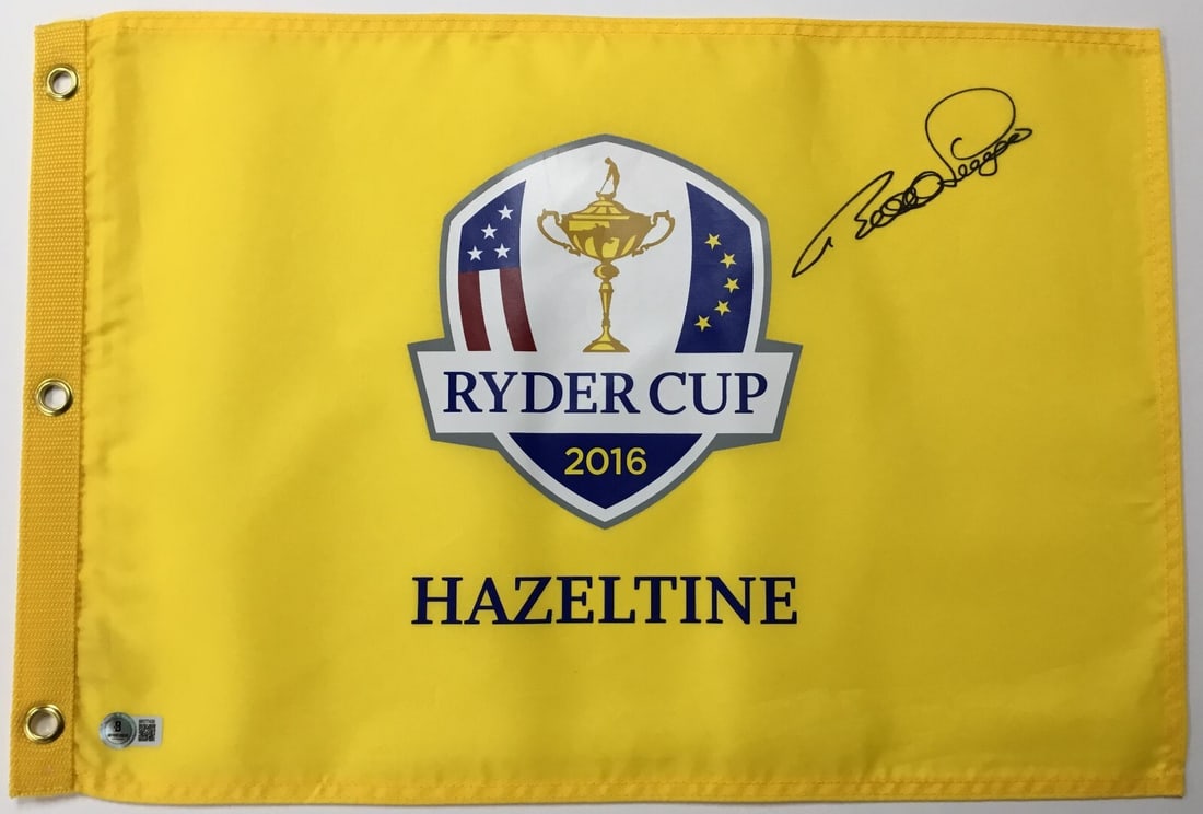 Bernhard Langer Signed 2016 Ryder Cup Hazeltine Flag Beckett Authenticated BR77439: Bernhard Langer Signed 2016 Ryder Cup Hazeltine Flag Beckett Authenticated BR77439 Celebrate the thrilling 2016 Ryder Cup with this officially licensed Hazeltine pin flag, expertly signed by golf