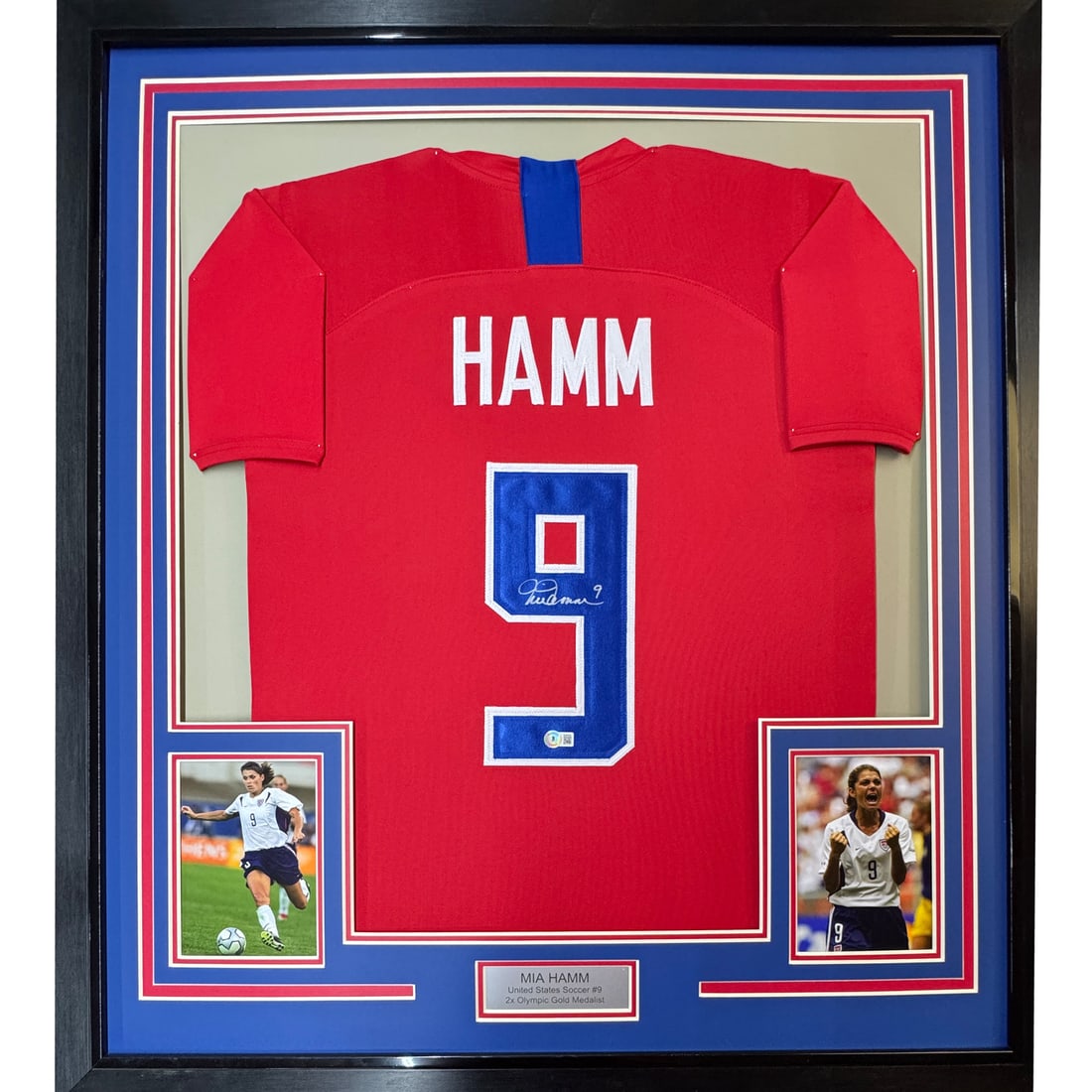 Framed Mia Hamm Autographed USA Jersey Beckett COA 35x39: Framed Mia Hamm Autographed USA Jersey Beckett COA 35x39 This framed display features an autographed Mia Hamm 35x39 Red Team USA jersey, a must-have for any soccer fan. The jersey is authenticated by
