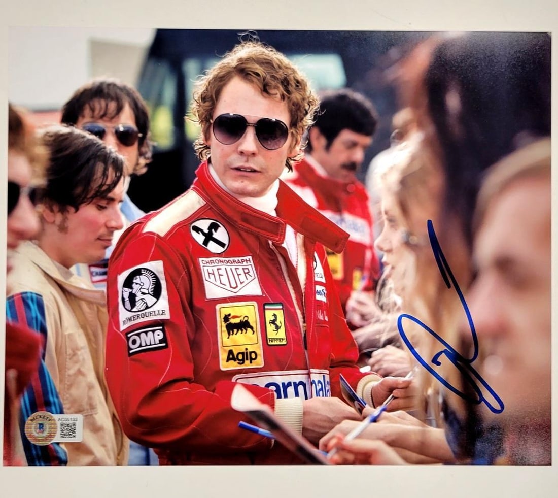 Daniel Bruhl Autographed 8x10 Rush Photo Beckett Authenticated: Daniel Bruhl Autographed 8x10 Rush Photo Beckett Authenticated This original 8x10 photograph features the signature of Daniel Bruhl from the movie Rush. The autograph has been authenticated by Beckett