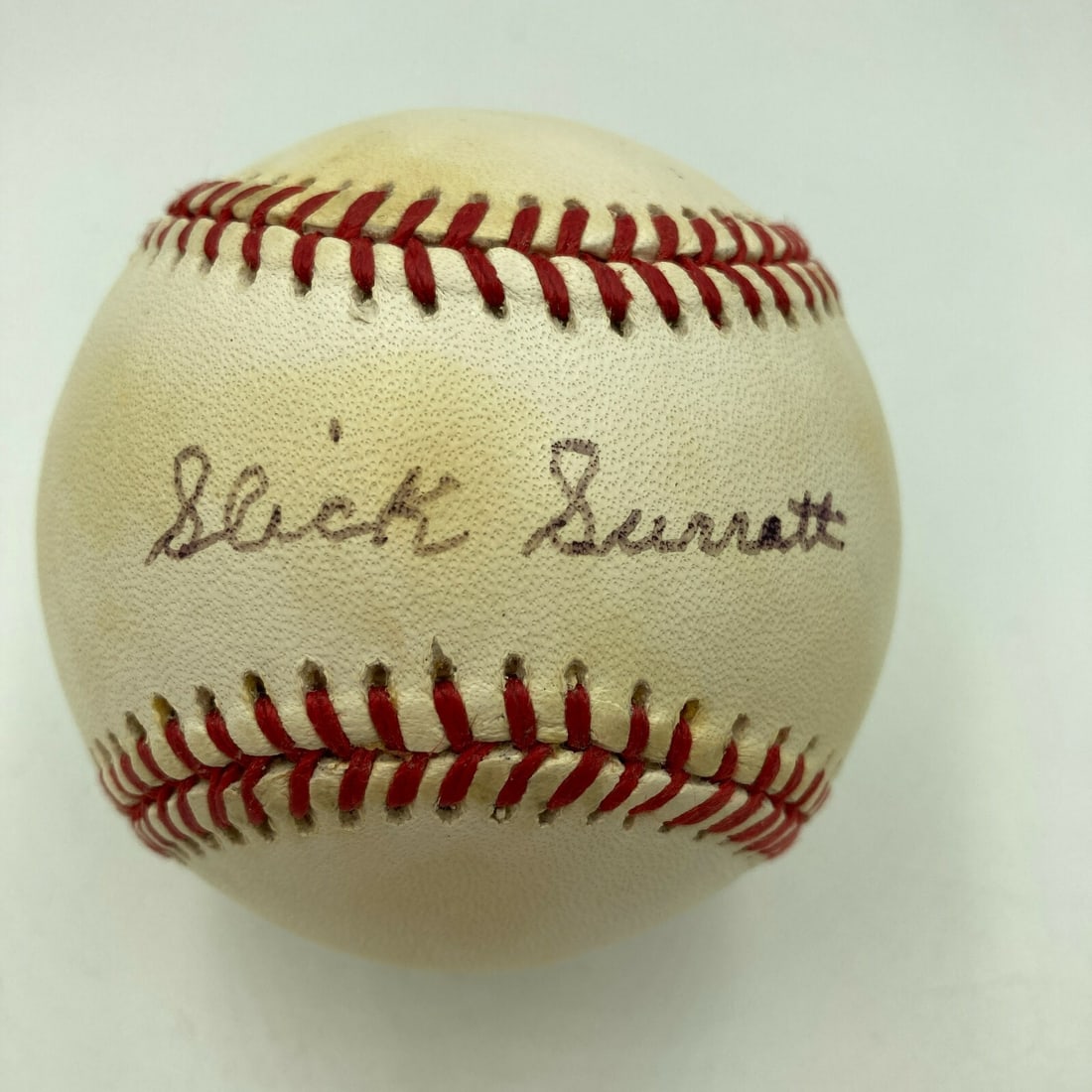 Slick Surratt Signed Major League Baseball Negro League Legend JSA Authenticated: Slick Surratt Signed Major League Baseball Negro League Legend JSA Authenticated This is an Official Major League Baseball signed by Slick Surratt, a notable Negro League legend. The ball comes with a