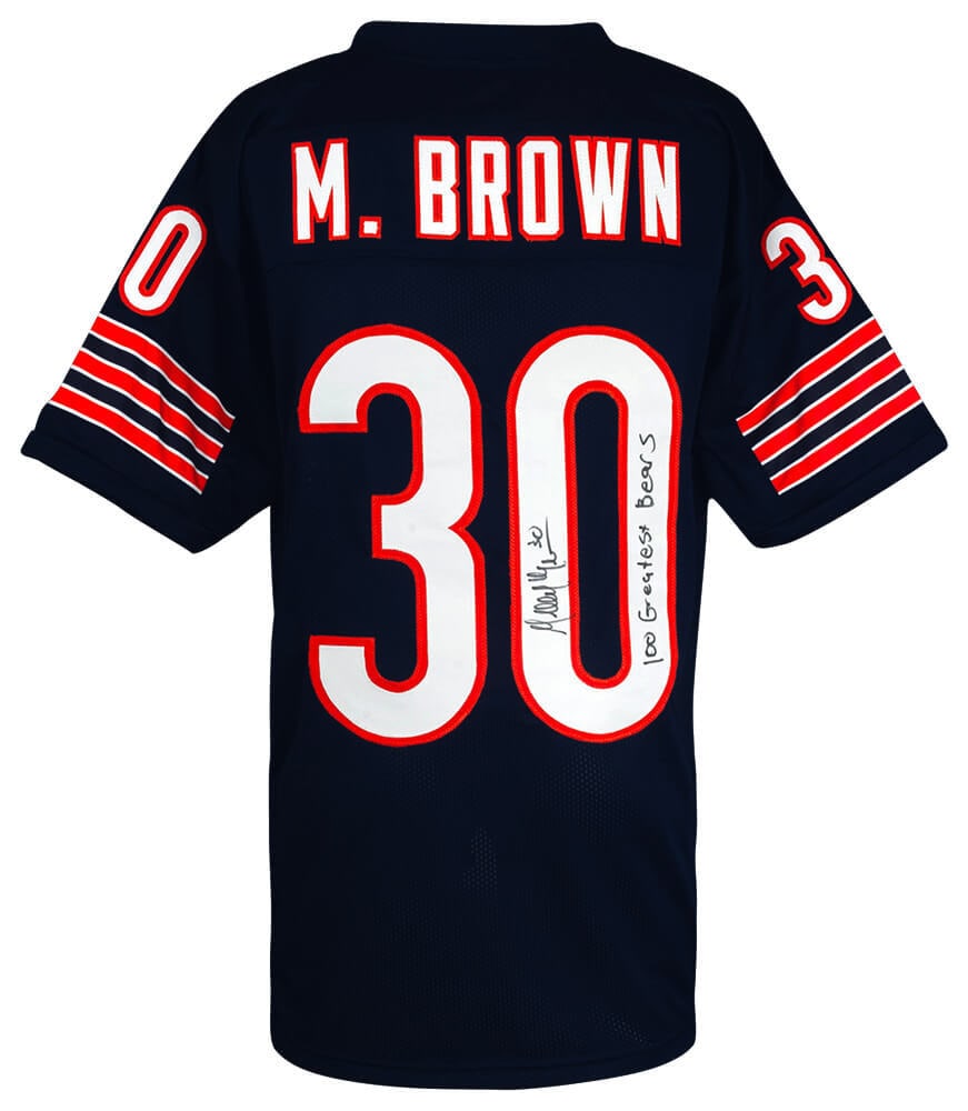 Mike Brown Signed Navy Custom Bears Jersey with 100 Greatest Inscription: Mike Brown Signed Navy Custom Bears Jersey with 100 Greatest Inscription This is a navy custom football jersey signed by Mike Brown, featuring the inscription '100 Greatest Bears.' The jersey is an or
