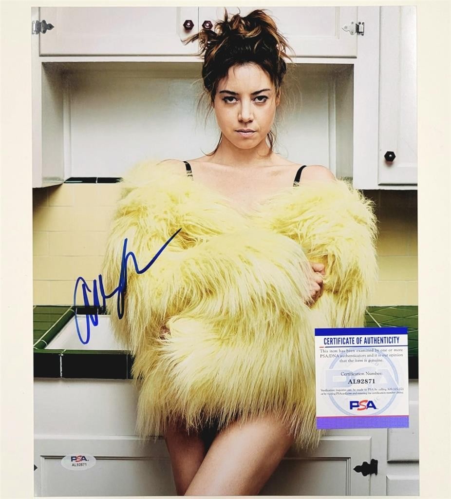 Aubrey Plaza 11x14 Autographed Photo PSA COA Parks and Rec: Aubrey Plaza 11x14 Autographed Photo PSA COA Parks and Rec Capture a memorable moment with this 11x14 photograph of Aubrey Plaza, featuring her autograph. This original photo is authenticated by PSA/D