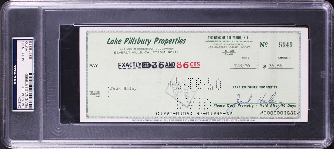 Jack Haley Double Signed 1970 Wizard Of Oz Check PSA/DNA 3.5x8.5: Jack Haley Double Signed 1970 Wizard Of Oz Check PSA/DNA 3.5x8.5 This remarkable double-signed check, measuring 3.5x8.5 inches, features the autograph of Jack Haley, famed for his role in The Wizard o