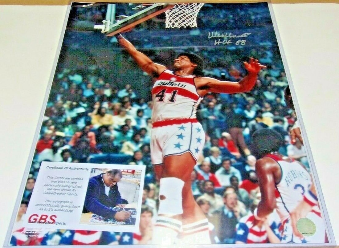 Wes Unseld Signed 16x20 Photo Washington Bullets HOF Finals MVP: Wes Unseld Signed 16x20 Photo Washington Bullets HOF Finals MVP This striking 16x20 photo commemorates Wes Unseld, a Hall of Famer known for his exceptional career with the Washington Bullets. The ima