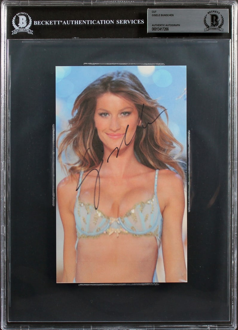 Gisele Bundchen Signed 4.5x8.5 Cut Signature Authentic Beckett Slabbed: Gisele Bundchen Signed 4.5x8.5 Cut Signature Authentic Beckett Slabbed This is an authentic cut signature of Gisele Bundchen, measuring 4.5x8.5 inches. The signature is slabbed and has been authentica