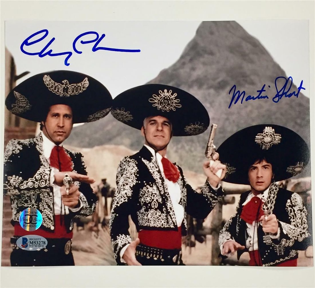 Chevy Chase Signed 8x10 Photo The Three Amigos Beckett Authenticated: Chevy Chase Signed 8x10 Photo The Three Amigos Beckett Authenticated This is a signed 8x10 photograph featuring Chevy Chase from the classic movie "The Three Amigos." The autograph has been authentica