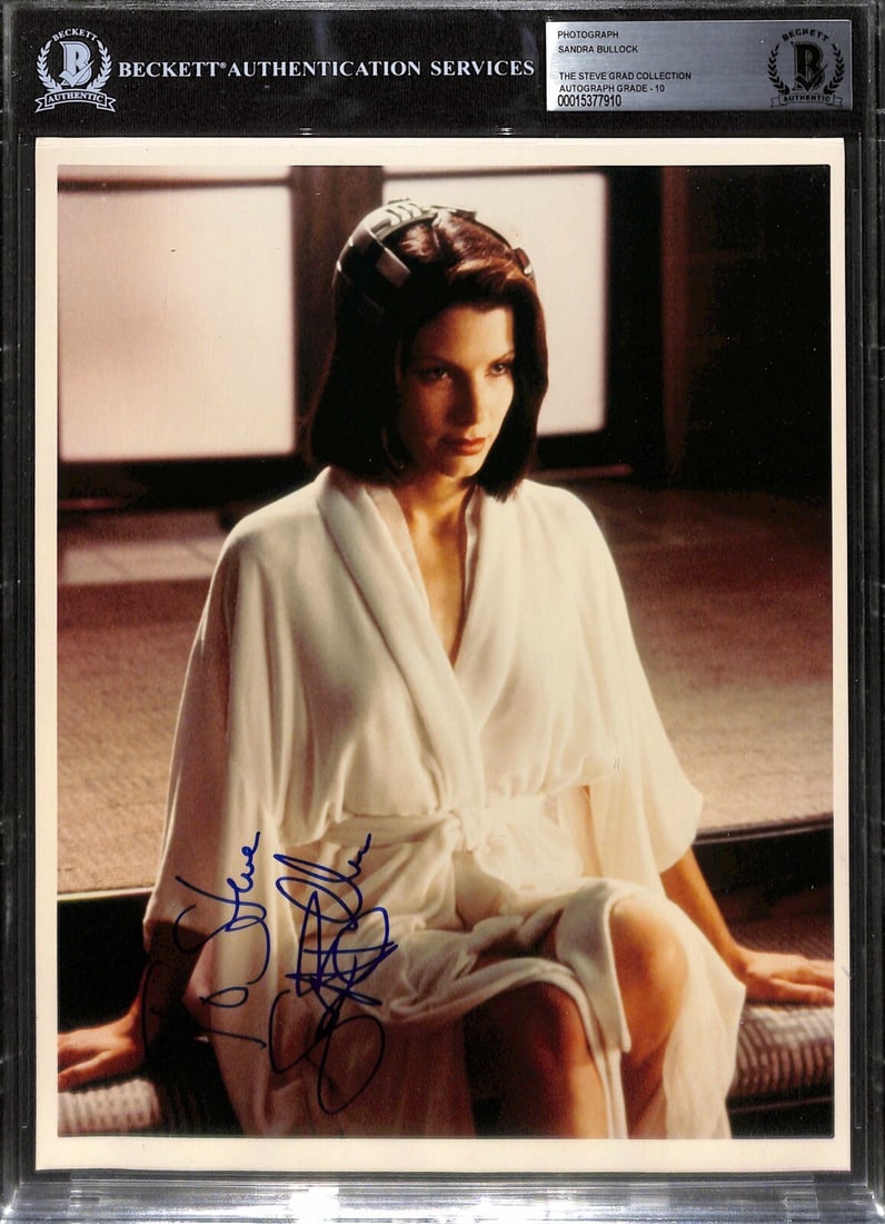 Sandra Bullock Signed 8x10 Photo Inscribed To Steve Beckett Grade 10: Sandra Bullock Signed 8x10 Photo Inscribed To Steve Beckett Grade 10 This autographed 8x10 photograph features actress Sandra Bullock, signed in blue permanent marker and inscribed 'To Steve'. The sig