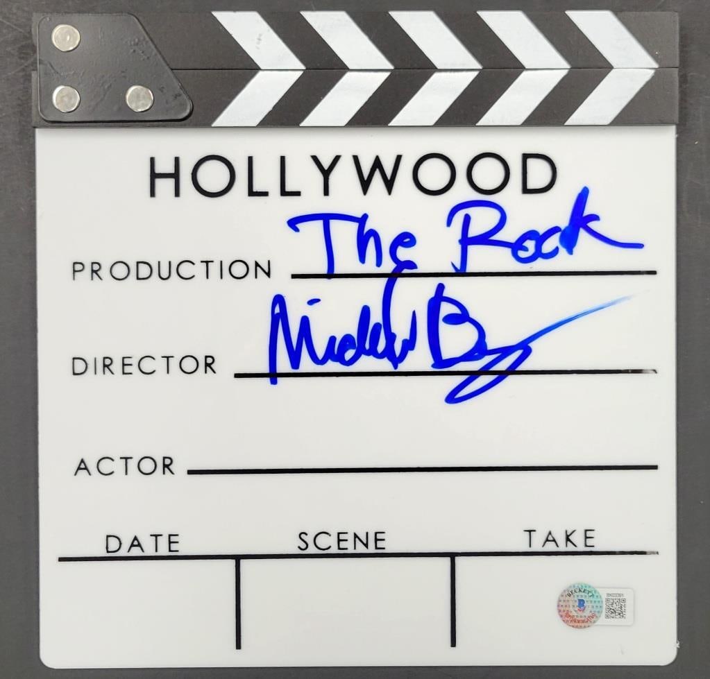 Michael Bay Autographed The Rock Clap Board Clapper Beckett Authenticated: Michael Bay Autographed The Rock Clap Board Clapper Beckett Authenticated This original clapboard clapper from the iconic film "The Rock" is signed by renowned director Michael Bay. The autograph is a