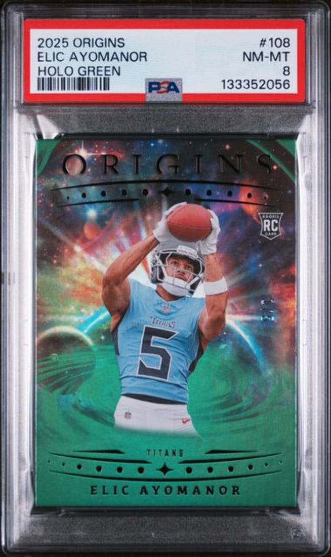 PSA 8 Elic Ayomanor 2025 Origins Holo Green Rookie Card 1 of 5: PSA 8 Elic Ayomanor 2025 Origins Holo Green Rookie Card 1 of 5 This is a 2025 Panini Origins Holo Green Elic Ayomanor #108 1/5 Rookie Card, featuring Elic Ayomanor of the Tennessee Titans. This origin