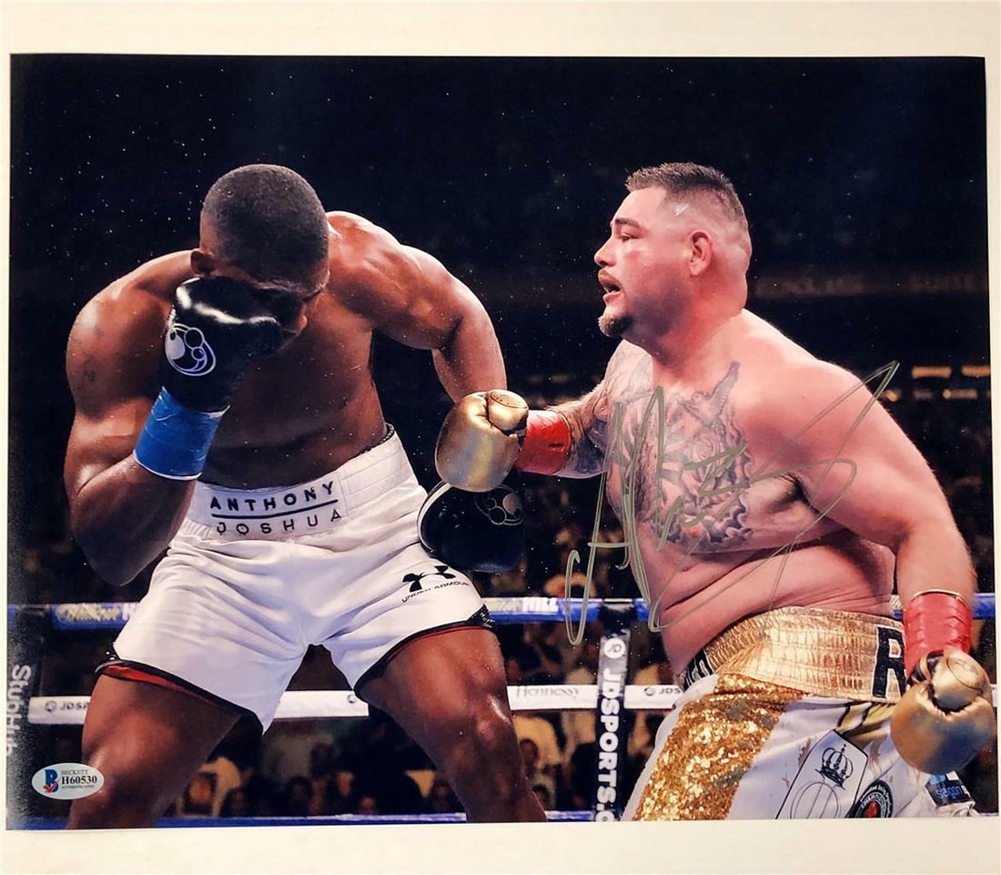 Andy Ruiz Jr Signed 11x14 Photo vs Anthony Joshua Beckett COA: Andy Ruiz Jr Signed 11x14 Photo vs Anthony Joshua Beckett COA This is an authentic 11x14 photo featuring Andy Ruiz Jr. in his iconic match against Anthony Joshua, personally signed by Ruiz himself. Th