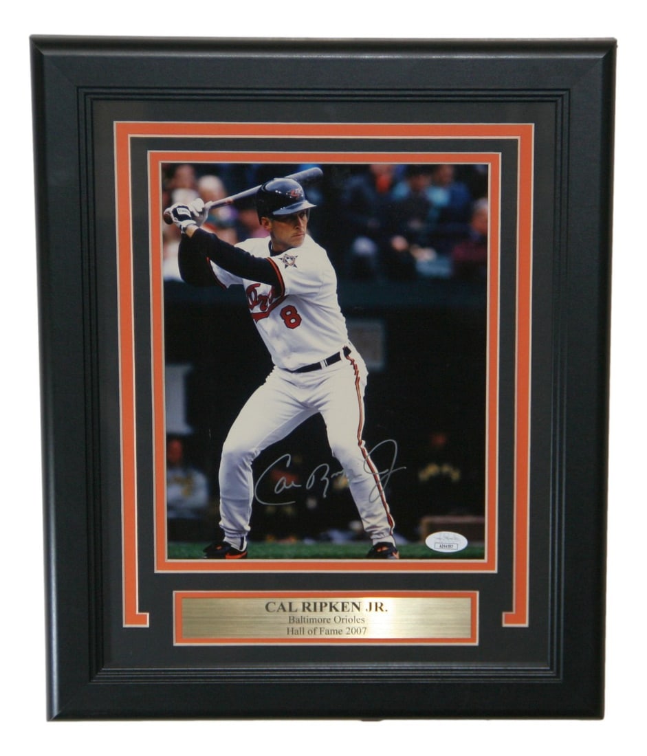 Cal Ripken Jr. Autographed 8x10 Framed Photo Baltimore Orioles JSA: Cal Ripken Jr. Autographed 8x10 Framed Photo Baltimore Orioles JSA This stunning framed 8x10 photo features the legendary Cal Ripken Jr., a celebrated player of the Baltimore Orioles. The photo is aut