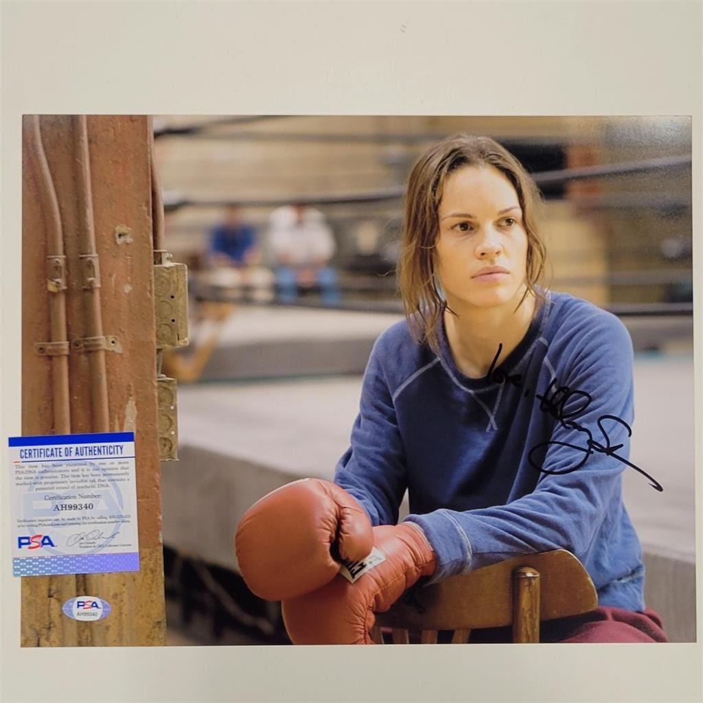 Hilary Swank Signed Million Dollar Baby 11x14 Photo PSA/DNA Authenticated: Hilary Swank Signed Million Dollar Baby 11x14 Photo PSA/DNA Authenticated This is an original 11x14 photograph of Hilary Swank from the film 'Million Dollar Baby,' featuring her authentic signature. T