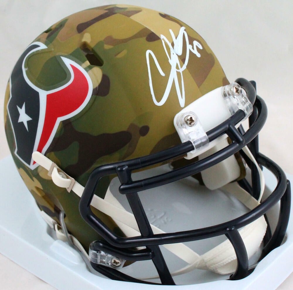 Andre Johnson Autographed Houston Texans Camo Mini Helmet JSA Auth: Andre Johnson Autographed Houston Texans Camo Mini Helmet JSA Auth This is an original camo speed mini helmet signed by NFL star Andre Johnson, a standout player for the Houston Texans. The helmet fea