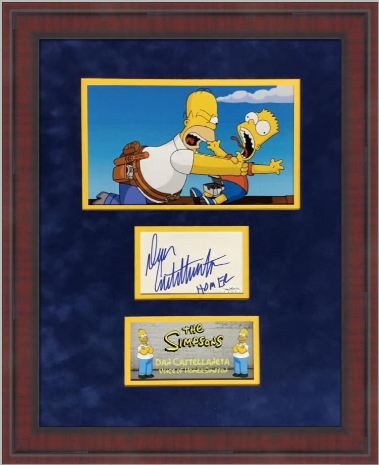 Dan Castellaneta Signed Display Voice of Homer Simpson JSA Authenticated: Dan Castellaneta Signed Display Voice of Homer Simpson JSA Authenticated This stunning custom framed display showcases a cut signature from Dan Castellaneta, the iconic voice of Homer Simpson. The sig