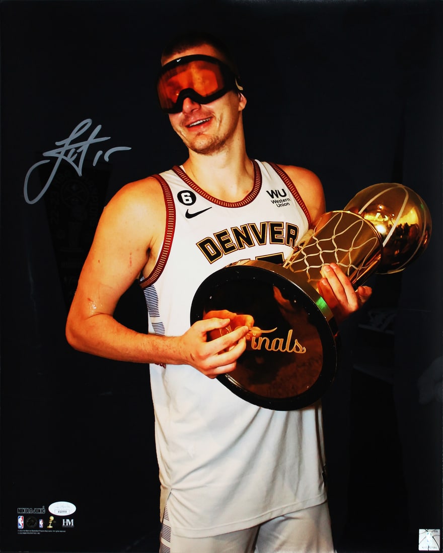 Nikola Jokic Signed 16x20 Photo Denver Nuggets JSA Authenticated Silver Signature: Nikola Jokic Signed 16x20 Photo Denver Nuggets JSA Authenticated Silver Signature This stunning 16x20 vertical photo features Nikola Jokic of the Denver Nuggets, captured in a championship spotlight m