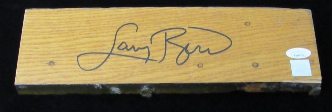 Larry Bird Autographed Boston Garden Parquet Floor 4x12 JSA Certified: Larry Bird Autographed Boston Garden Parquet Floor 4x12 JSA Certified This collectible features a genuine piece of the Boston Garden Parquet court floor, measuring 4" x 12" x 1". It is autographed by