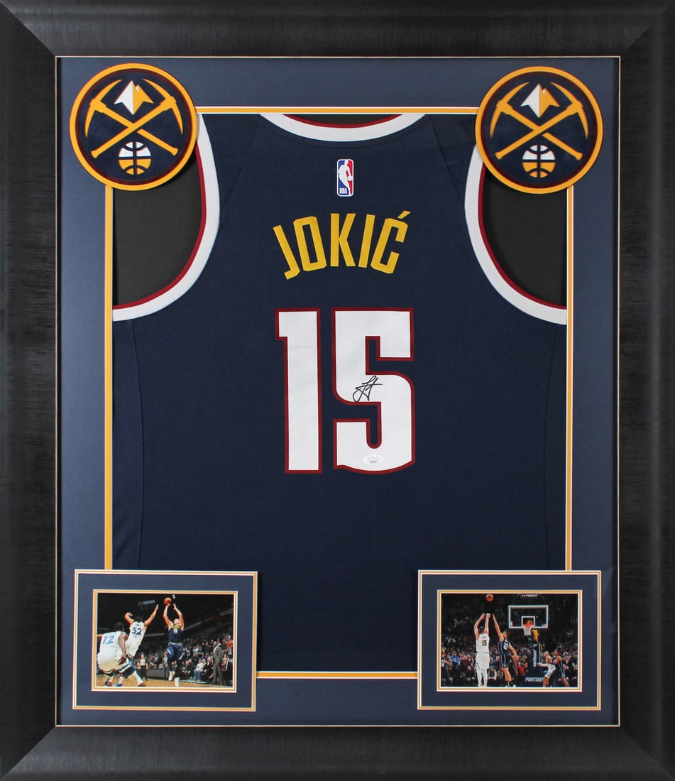 Nikola Jokic Signed Framed Navy Blue Nike Swingman Jersey JSA COA: Nikola Jokic Signed Framed Navy Blue Nike Swingman Jersey JSA COA This authentic, autographed navy blue Nike Swingman jersey features the signature of Nikola Jokic, the star player of the Denver Nugge