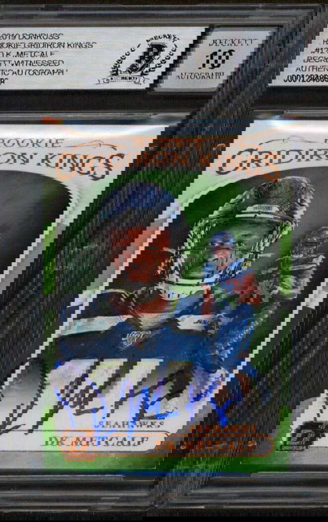 D.K. Metcalf Signed 2019 Donruss Rookie Gridiron Kings #12 Card Gem Mint 10: D.K. Metcalf Signed 2019 Donruss Rookie Gridiron Kings #12 Card Gem Mint 10 This is a 2019 Donruss Rookie Gridiron Kings #12 card featuring D.K. Metcalf of the Seattle Seahawks. The card is autographe