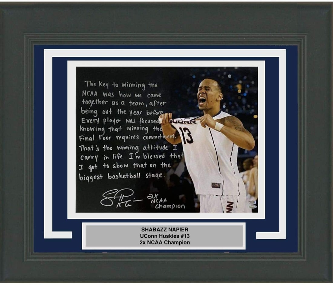 Framed Autographed Shabazz Napier UConn 16x20 Photo Fanatics COA: Framed Autographed Shabazz Napier UConn 16x20 Photo Fanatics COA This professionally framed and matted 16x20 photo of Shabazz Napier showcases his legacy with the UConn Huskies. The photo is autograph