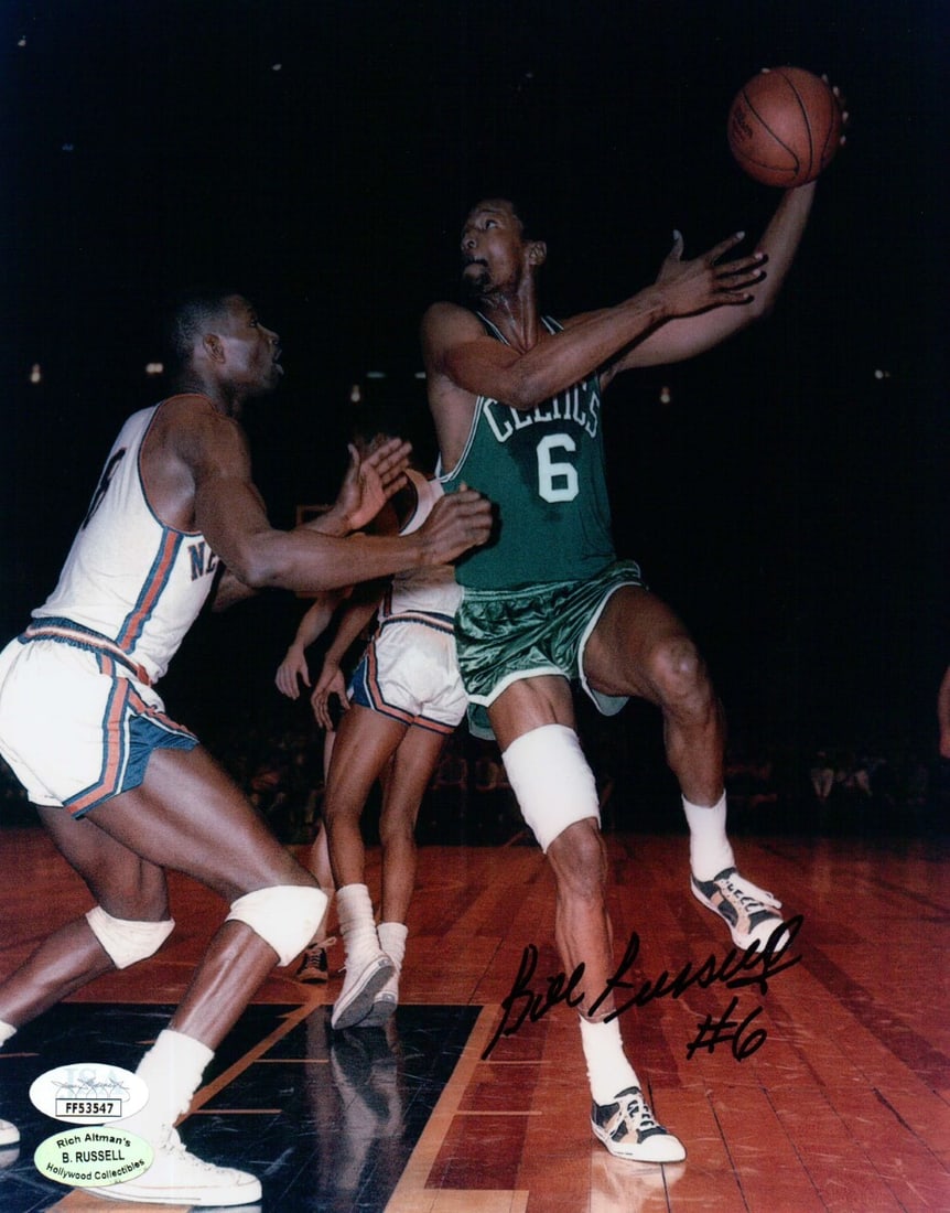 Bill Russell Autographed 8X10 Hook Shot Photo Boston Celtics JSA Certified: Bill Russell Autographed 8X10 Hook Shot Photo Boston Celtics JSA Certified This original 8X10 photo features the legendary Bill Russell in action, showcasing his iconic hook shot. The photograph is au
