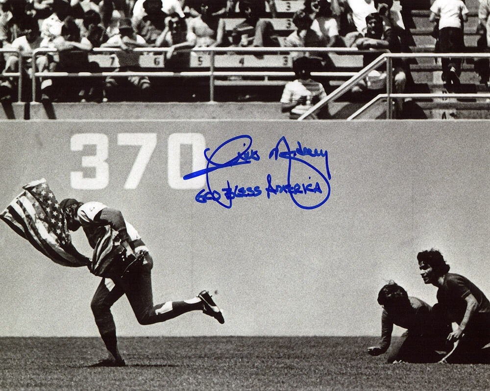 Rick Monday Autographed 8x10 Cubs Flag Photo With God Bless America Inscription COA: Rick Monday Autographed 8x10 Cubs Flag Photo With God Bless America Inscription COA This is an original 8x10 black and white photo featuring Rick Monday of the Chicago Cubs, signed by Rick Monday with