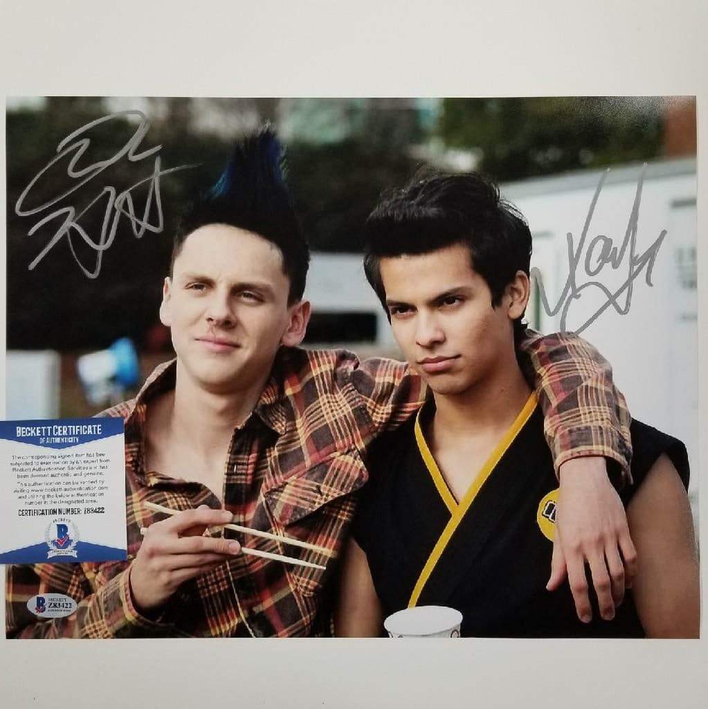 Xolo Mariduena Jacob Bertrand Signed Cobra Kai 11x14 Photo Beckett COA: Xolo Mariduena Jacob Bertrand Signed Cobra Kai 11x14 Photo Beckett COA This 11x14 photo features the signatures of Xolo Mariduena and Jacob Bertrand, stars from the popular series Cobra Kai. The item
