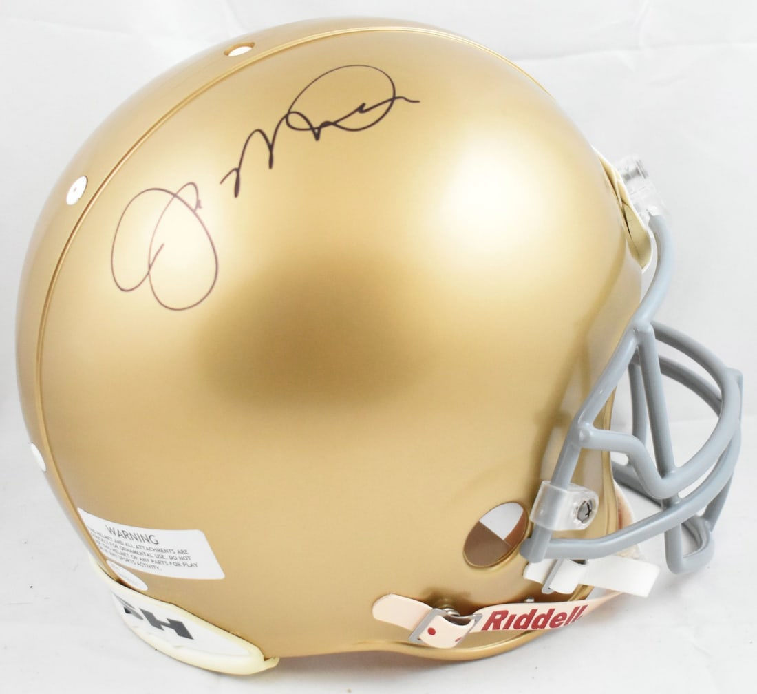 Joe Montana Signed Notre Dame Full Size Helmet - JSA Certified: Joe Montana Signed Notre Dame Full Size Helmet - JSA Certified This authentic full-size helmet features the signature of legendary quarterback Joe Montana, making it a must-have for any Notre Dame fan