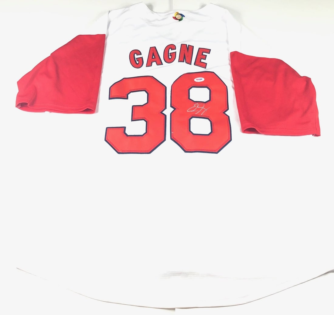 Eric Gagne Team Canada Autographed Jersey PSA/DNA Certified: Eric Gagne Team Canada Autographed Jersey PSA/DNA Certified This is a pre-owned stitched jersey autographed by Eric Gagne, a notable player for Team Canada. The signature has been authenticated by PSA