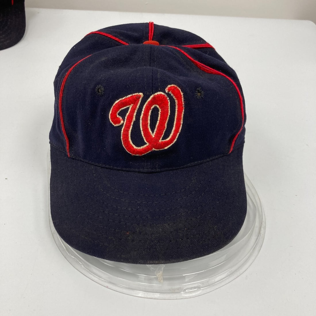 Authentic 1960's Game Used Washington Senators Baseball Cap: Authentic 1960's Game Used Washington Senators Baseball Cap This vintage 1960's Washington Senators game-used baseball cap is a remarkable piece of sports memorabilia. Featuring the iconic design of t