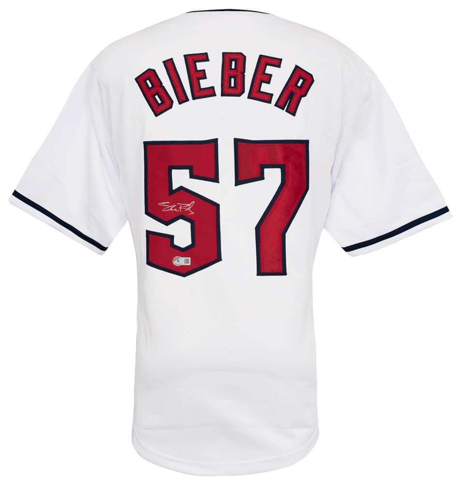 Shane Bieber Signed White Baseball Jersey with Beckett COA: Shane Bieber Signed White Baseball Jersey with Beckett COA This is a signed white custom baseball jersey by Shane Bieber, a standout player for the Cleveland Indians. The jersey features an authentic