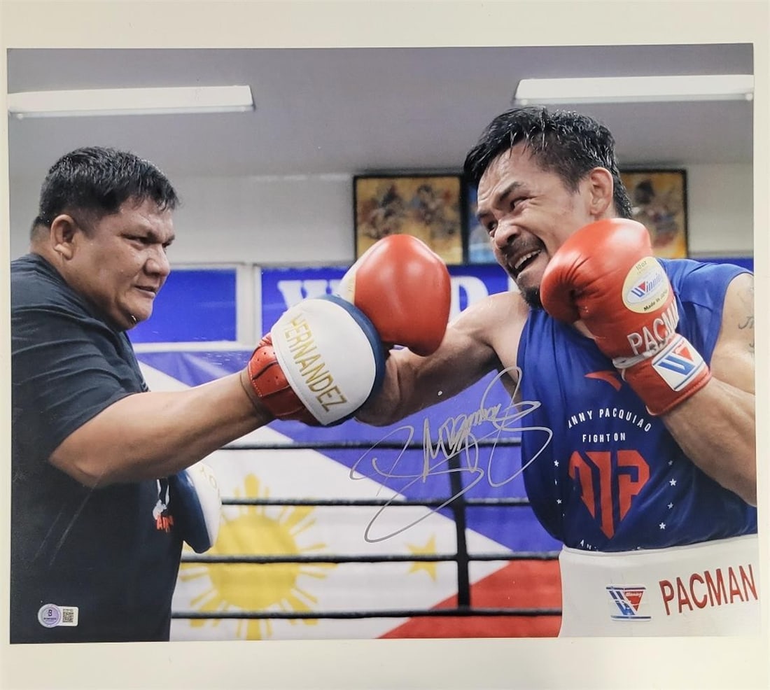 Manny Pacquiao Signed 16x20 Boxing Photo with Beckett Authentication: Manny Pacquiao Signed 16x20 Boxing Photo with Beckett Authentication Celebrate the legacy of boxing with this stunning 16x20 photo signed by Manny Pacquiao. This original photograph captures the essen