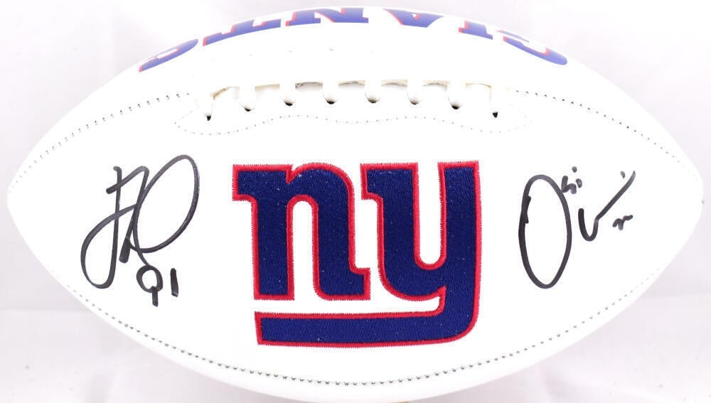 Justin Tuck Osi Umenyiora Signed Giants Football Beckett Authenticated: Justin Tuck Osi Umenyiora Signed Giants Football Beckett Authenticated This is an original New York Giants logo football signed by players Justin Tuck and Osi Umenyiora. The autographs are authenticat