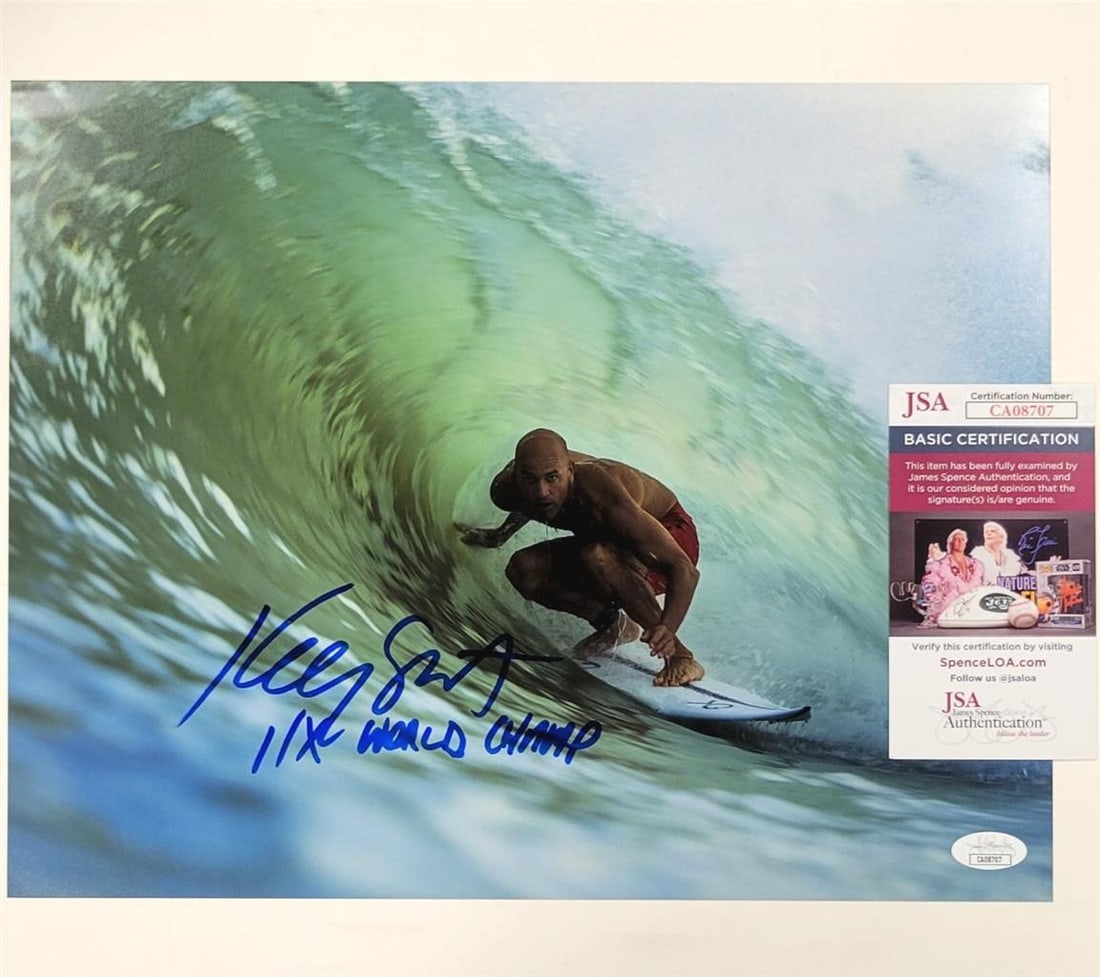 Kelly Slater Signed 11x14 Photo 11x World Champ JSA Authenticated: Kelly Slater Signed 11x14 Photo 11x World Champ JSA Authenticated Capture a piece of surfing history with this Kelly Slater signed 11x14 photograph, celebrating his incredible achievement as an 11-tim