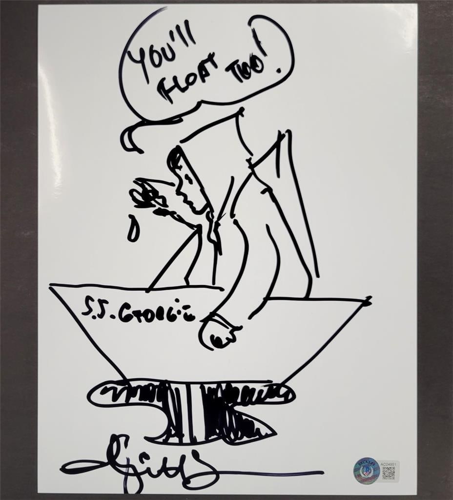 Andy Muschietti Signed 8.5x11 Photograph Georgie It Beckett Authenticated: Andy Muschietti Signed 8.5x11 Photograph Georgie It Beckett Authenticated This is an original photograph signed by director Andy Muschietti, featuring a sketch of Georgie from the iconic horror film "