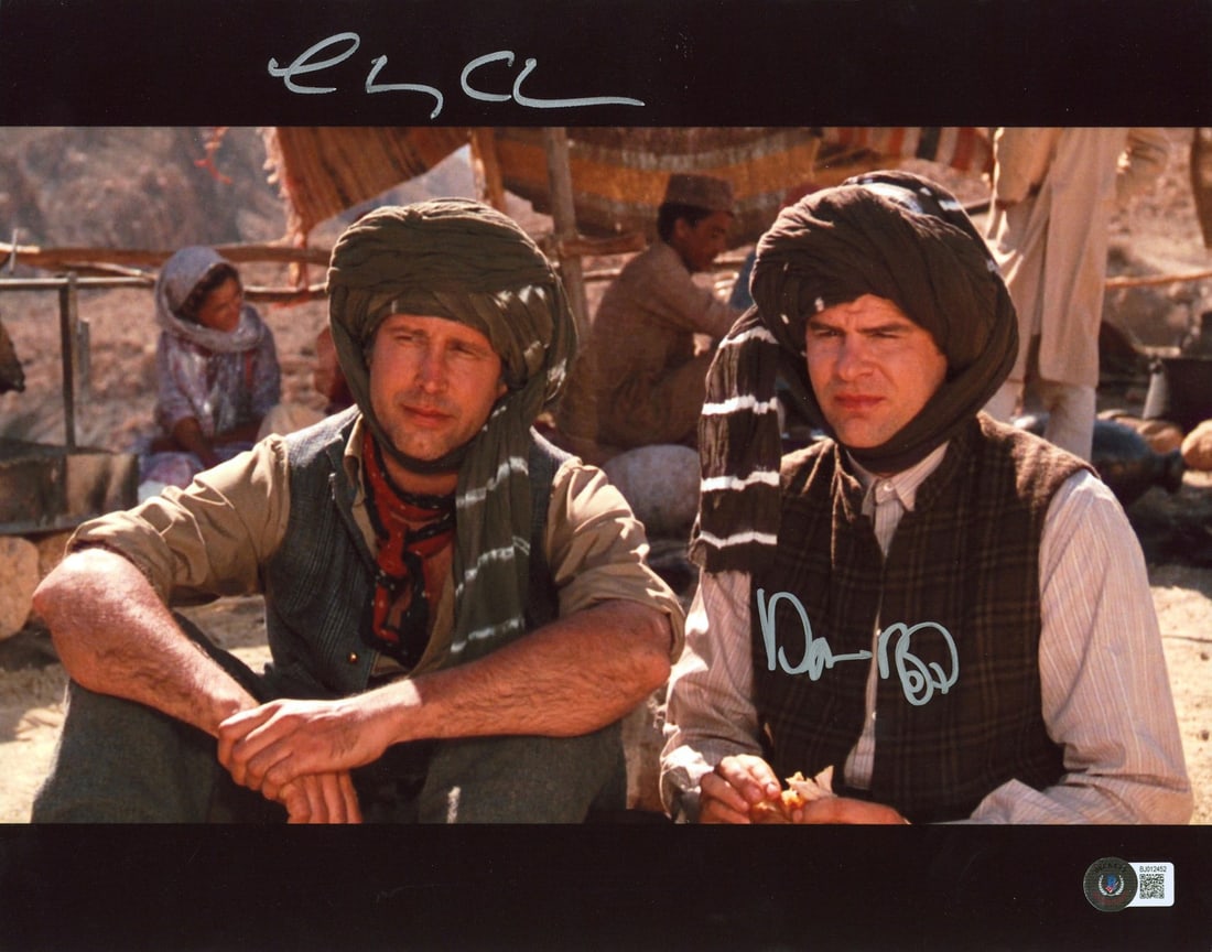 11x14 Spies Like Us Photo Signed by Chevy Chase and Dan Aykroyd Beckett Authenticated: 11x14 Spies Like Us Photo Signed by Chevy Chase and Dan Aykroyd Beckett Authenticated This is an original 11x14 photograph from "Spies Like Us," personally signed by Chevy Chase and Dan Aykroyd. The p