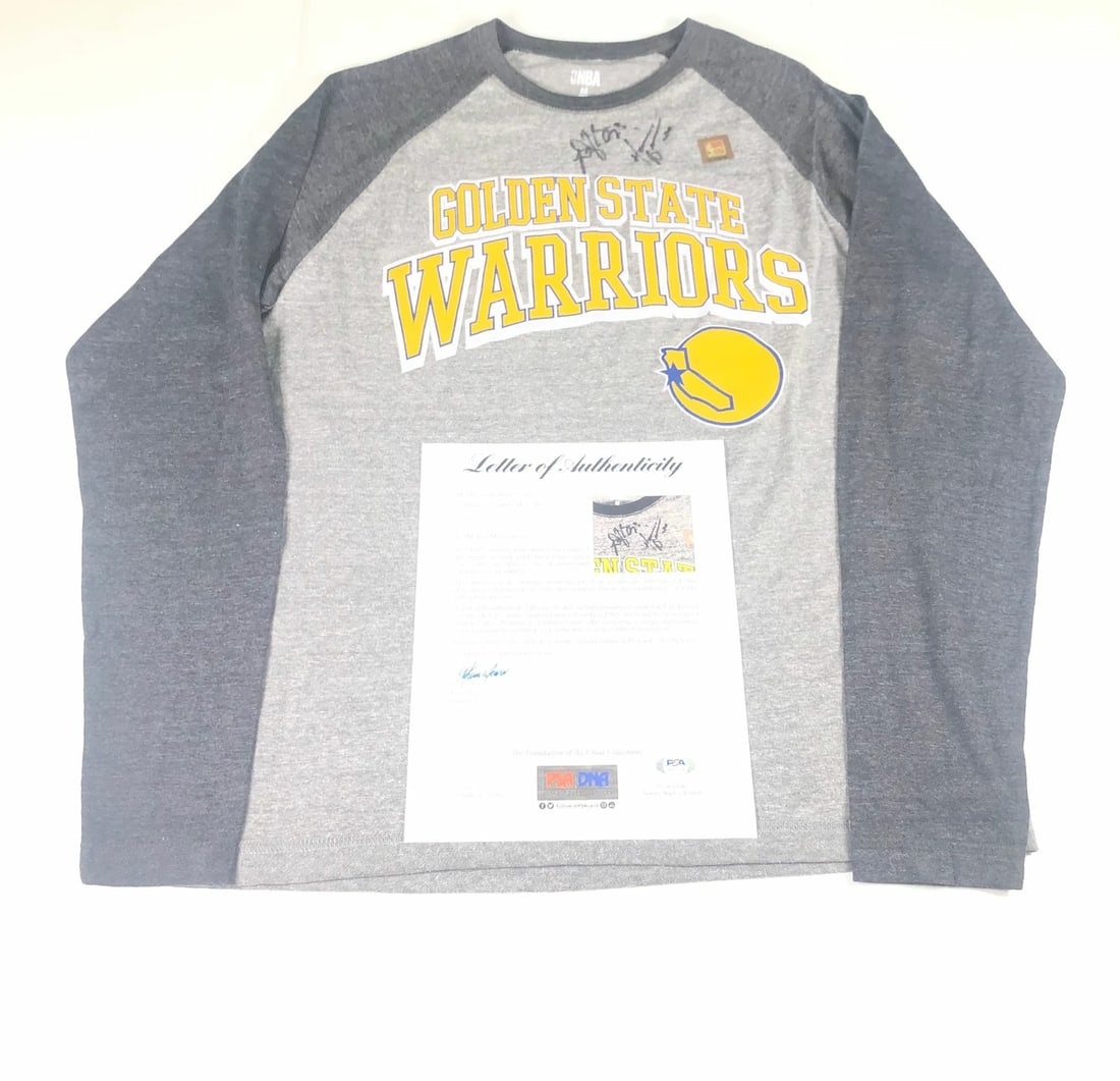 Draymond Green Harrison Barnes Signed T-Shirt PSA/DNA Golden State Warriors: Draymond Green Harrison Barnes Signed T-Shirt PSA/DNA Golden State Warriors This item is a T-Shirt signed by NBA players Draymond Green and Harrison Barnes, showcasing their autographs authenticated b