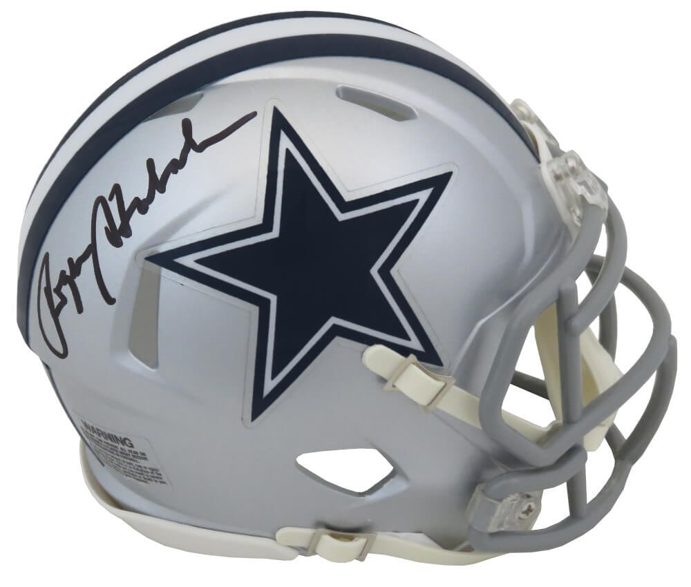 Roger Staubach Signed Cowboys Mini Helmet with COA: Roger Staubach Signed Cowboys Mini Helmet with COA Roger Staubach Signed Cowboys Mini Helmet with COA This collectible item features a signed Riddell Speed mini helmet, commemorating the legendary foo