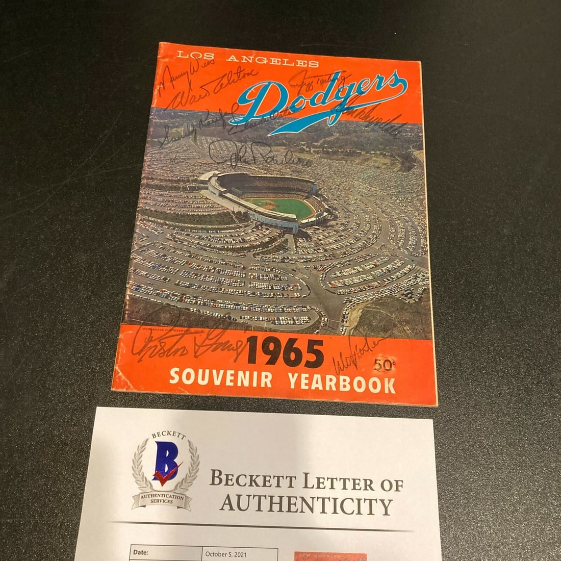 1965 Dodgers World Series Champs Team Signed Yearbook Koufax BAS: 1965 Dodgers World Series Champs Team Signed Yearbook Koufax BAS Celebrate the legacy of the 1965 Los Angeles Dodgers with this original yearbook from their championship season. This team-signed progr