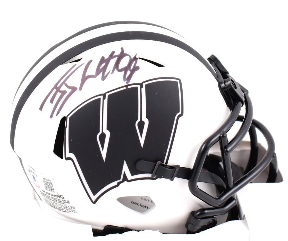 JJ Watt Signed Wisconsin Badgers Mini Helmet Beckett Authenticated: JJ Watt Signed Wisconsin Badgers Mini Helmet Beckett Authenticated This is a Wisconsin Badgers Lunar Speed Mini Helmet autographed by NFL player JJ Watt. The helmet features an original signature auth