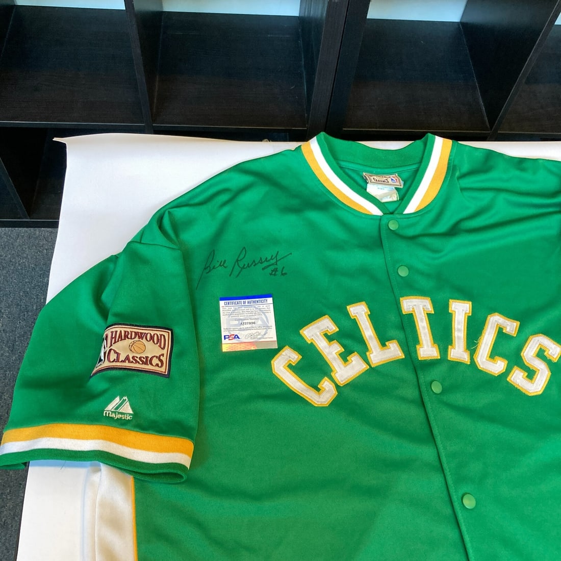 Bill Russell Signed Celtics Shooting Shirt PSA DNA COA: Bill Russell Signed Celtics Shooting Shirt PSA DNA COA This is an original Hardwood Classics Boston Celtics shooting shirt, signed by legendary NBA player Bill Russell. The shirt comes with a PSA DNA