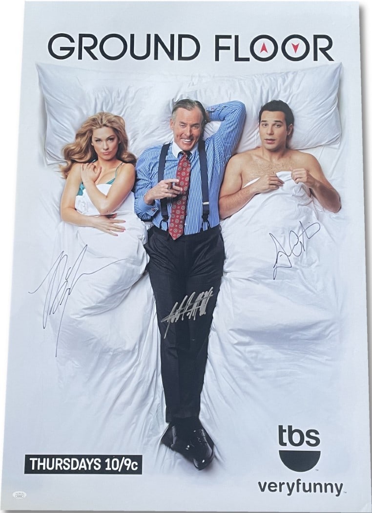 Ground Floor Cast Signed 27x40 WB Poster JSA Certified: Ground Floor Cast Signed 27x40 WB Poster JSA Certified This is an original 27x40 Warner Bros poster from the show 'Ground Floor,' autographed by cast members John C. McGinley, Skylar Astin, and Briga