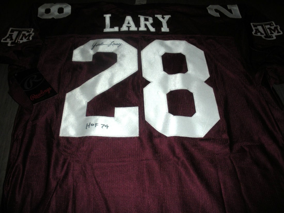 Rare Yale Lary Texas A&M Jersey with COA by Rawlings: Rare Yale Lary Texas A&M Jersey with COA by Rawlings This is an official licensed Rawlings jersey, signed by Yale Lary, a notable player from Texas A&M Aggies. It comes with a Certificate of Authentic