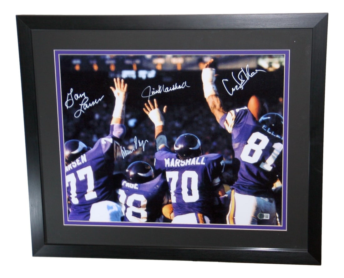 Framed 16x20 Photo Signed by Purple People Eaters with BAS Authentication: Framed 16x20 Photo Signed by Purple People Eaters with BAS Authentication This framed 16x20 photograph features the signatures of the legendary Purple People Eaters--Marshall, Page, Eller, and Larsen.
