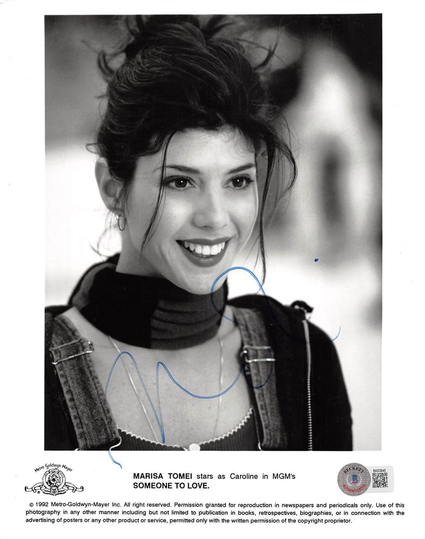 Marisa Tomei Signed 8x10 Photo Someone To Love Beckett Authenticated: Marisa Tomei Signed 8x10 Photo Someone To Love Beckett Authenticated This authentic 8x10 photograph features a signature from Marisa Tomei, known for her role in the film 'Someone To Love.' The item i