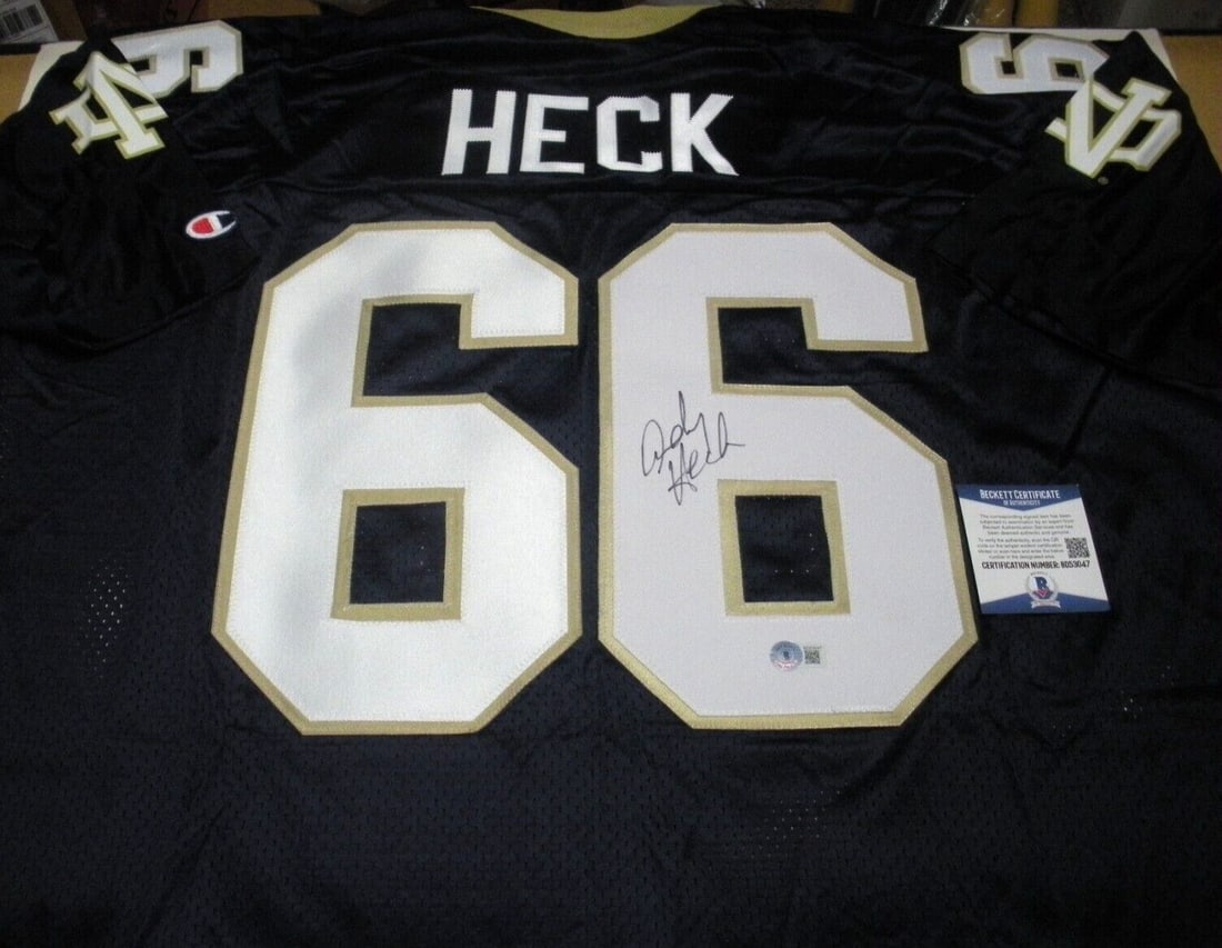 Andy Heck Signed Notre Dame Champion Jersey with COA: Andy Heck Signed Notre Dame Champion Jersey with COA This officially licensed Champion jersey features the Notre Dame Irish logo and is signed by Andy Heck. A must-have for fans of Notre Dame football
