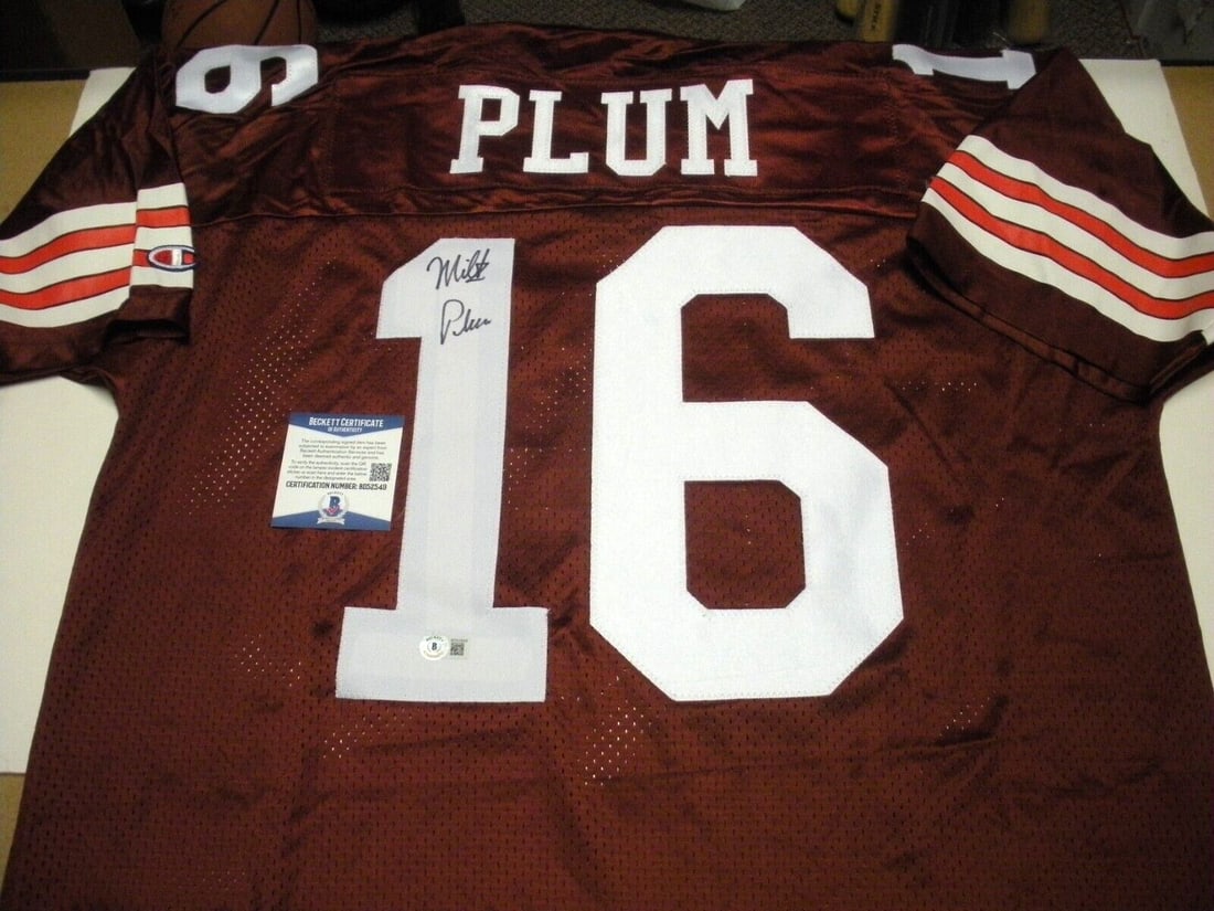 Milt Plum Signed Cleveland Browns Champion Jersey with COA: Milt Plum Signed Cleveland Browns Champion Jersey with COA This officially licensed Champion jersey is a collectible piece featuring the name of Milt Plum, a notable player for the Cleveland Browns. T