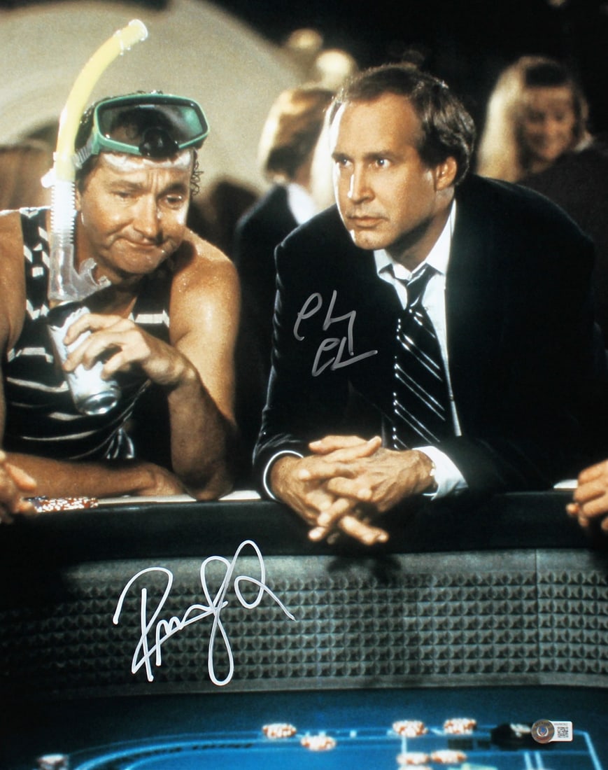 Chevy Chase Randy Quaid Signed 16x20 Photo National Lampoon Vegas Vacation BAS: Chevy Chase Randy Quaid Signed 16x20 Photo National Lampoon Vegas Vacation BAS This stunning 16x20 vertical photograph features the iconic Chevy Chase and Randy Quaid from National Lampoon's Vegas Vac