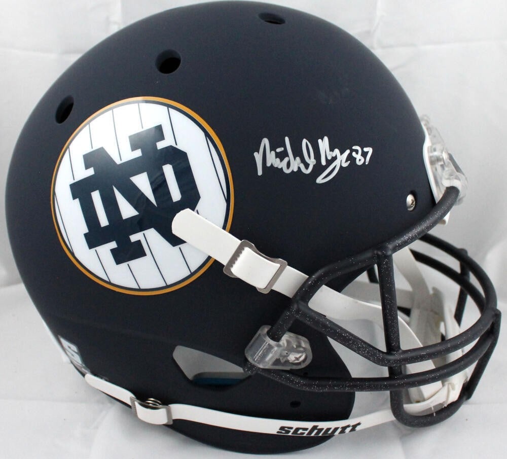 Michael Mayer Signed Notre Dame Helmet with Beckett Authentication: Michael Mayer Signed Notre Dame Helmet with Beckett Authentication This authentic Notre Dame Fighting Irish football helmet features the signature of Michael Mayer, a standout player. The helmet is a