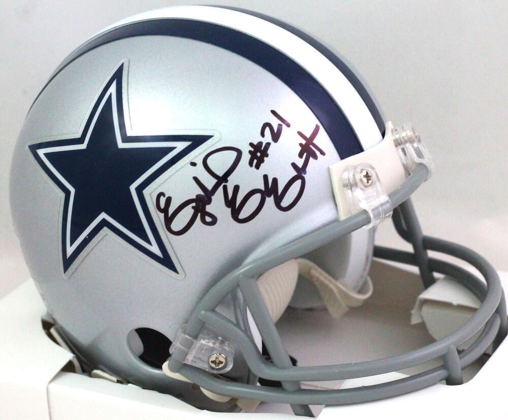 Ezekiel Elliott Signed Dallas Cowboys Mini Helmet Beckett Authenticated: Ezekiel Elliott Signed Dallas Cowboys Mini Helmet Beckett Authenticated This authentic mini helmet, signed by Ezekiel Elliott, showcases the star player's autograph prominently. A must-have for any Da
